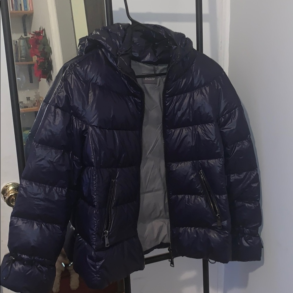 Blue coat. Has pockets and a hood!